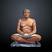 The Seated Scribe; 2613–2494 BC; painted limestone and inlaid quartz; height: 53.7 cm; Louvre