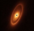 Image 68Astronomers used the James Webb Space Telescope to image the warm dust around a nearby young star, Fomalhaut, in order to study the first asteroid belt ever seen outside of the Solar System in infrared light. (from Cosmic dust)