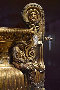 Ancient Greek medallion on a handle of the Derveni Krater, c.370 BC, bronze and silver, Archaeological Museum of Thessaloniki, Thessaloniki, Greece[2]