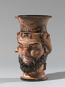 Etruscan vessel with a single handle, in the shape of a satyr's head, c.340 BC, ceramic, Petit Palais, Paris