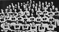 A group of men pose for a team photograph
