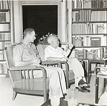 Reid sitting alongside Israeli prime minister David Ben Gurion. 1960, Boris Carmi, Meitar collection, National Library of Israel