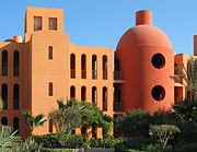 In the architectural design of the Steigenberger Hotel in El Gouna, Egypt, the minimalist design with 3-D geometric composition, and monochromatic coloring scheme provides graphical compositions from various angles.
