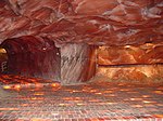 Interior of a salt mine with corridor walls in pink and reddish colours