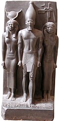 Menkaura alongside Hathor and the nome goddess Anput