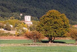 The church tower of Signes, amongst the trees