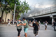Miami protesters react to police firing chemical irritants on May 30