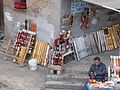 A vendor of tobacco and traditional Yunnan smoking pipes in Jianshui, Yunnan, China
