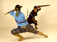 Krabi krabong practitioners with Thai swords (daab)