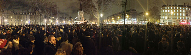 Demonstrators gather at the Place de la République in Paris on the night of the attack