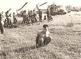 ARVN troops with suspected VC member, 1965