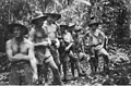 A section of 'C' Platoon, 2/5th Independent Company, marching along a jungle track, west of Bulwa in the Bulolo Valley.