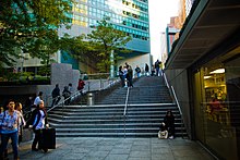 A 2007 image of stairs leading from the building's sunken plaza to street level