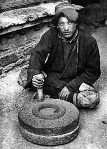 Millstone wheel used in Tibet (Lhasa, 1938)