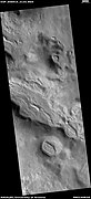 Wide view of groups of layers, as seen by HiRise under HiWish program. These layers probably represent mantle deposited when climate changed. They were shaped by the wind.