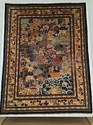 Imperial Chinese carpet depicting "The eight horses of King Mu". China, 19th century, Museum für Kunst und Gewerbe