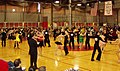 Image 16Intermediate level international-style Latin dancing at the 2006 MIT ballroom dance competition. A judge stands in the foreground. (from Culture of Latin America)
