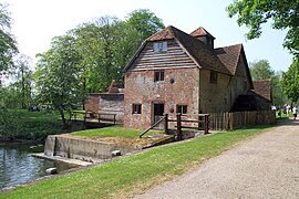 The watermill seen from the foot of the village street