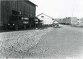 Trucks loaded with celery arriving at a loading station in preparation for being loaded into railroad cars, Lake Labish area near Brooks, Oregon