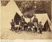 Photo entitled: "What do I want, John Henry"?, Warrenton, Virginia, 1862, showing 2nd from left John Henry and 4 Union officers.