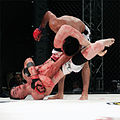 Image 51MMA fighter attempts a Triangle-Armbar submission on his opponent. (from Mixed martial arts)