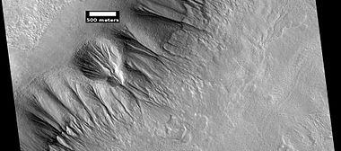 Gullies along mesa wall in North Tempe Terra, as seen by HiRISE under HiWish program