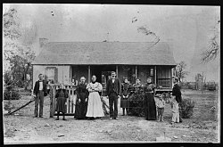 The Johnson Family in front of their home (later the birthplace of Lyndon Johnson). Sam Ealy Johnson Sr. (center) with family members. On his right is his wife, Eliza Bunton Johnson; to her right is her mother, Priscilla Jane McIntosh Bunton. In or near Stonewall, Texas