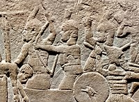 Armoured Kushite soldiers of Taharqa defending their city from the Assyrian assault