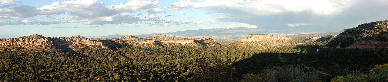 cliffs, mesas, pine-filled canyons, and distant mountains