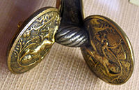 Two small plaquettes by Riccio used in a dagger hilt