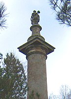 The top of the Column to Liberty, the figure seen from behind.