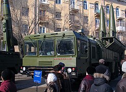 Transporter erector launcher "Iskander-E" with two missiles and "Tochka-U" launcher (lhs background) at the display of military equipment exhibition dedicated to the anniversary of victory in the Battle of Stalingrad, in Volgograd 2 February 2008