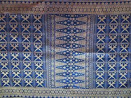 Songket fabric with keris motif with a bamboo shoot in the middle from West Sumatra, Pucuak rabuang is one of the Minangkabau traditional motifs.