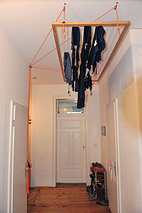 An overhead clothes airer with pulleys