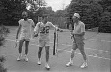 Gerald Ford, Donald Rumsfeld, and David Kennerly following a tennis match on the court in 1976