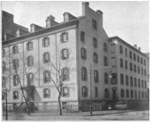 Black and white three-quarter view of St. Vincent's Orphan Asylum building