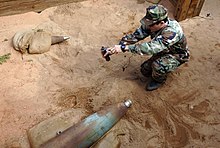 An explosive charge is prepared to be used for rendering unexploded ordnance safe to handle at the Naval School of Explosive Ordnance Disposal.