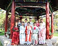 Some students wearing diverse forms of Hanfu during a spring outing.