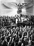 Audience gives Nazi salute during the speech