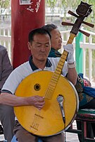 China, ruan-family instrument, either a bass daruan (大阮) or contrabass diyinruan (低音阮)