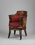 Empire desk chair; c.1805–1808; mahogany, gilt bronze and satin-velvet upholstery; 87.6 × 59.7 × 64.8 cm; Metropolitan Museum of Art (New York City)