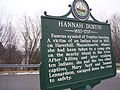 Modern roadside historical marker in Boscawen, New Hampshire, about the 1697 scalping incident involving Hannah Duston