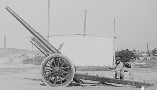 A prototype of the Type 14 10 cm cannon during firing tests in 1923