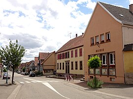 The town hall and main street in Kirrwiller