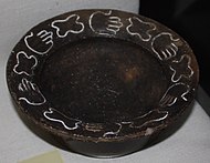 Moundville bowl with Trophy theme engravings