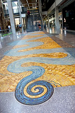 The River of Life Mosaic at the University of Iowa Campus Recreation and Wellness Center designed and made by Gary Drostle in 2010.