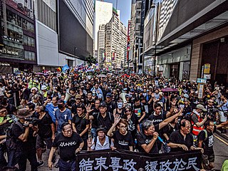Protesters marching in Causeway Bay