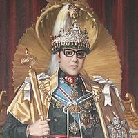 King Birendra depicted with the crown and sceptre in a portrait