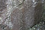 In Steinplatte graviertes keltisches Kreuz