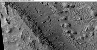 Layers and mounds in Medusae Fossae Formation, as seen by HiRISE under HiWish program. Location is East of Gale Crater in the Aeolis quadrangle.